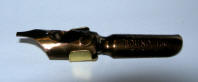 Underside of Dip pen nib showing correct placement of fitted reservoir